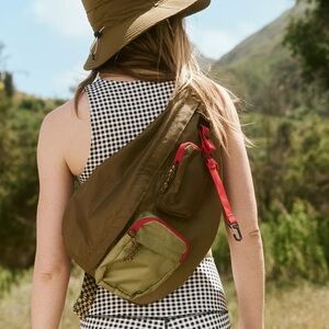 The Great. x Eddie Bauer sling backpack green red